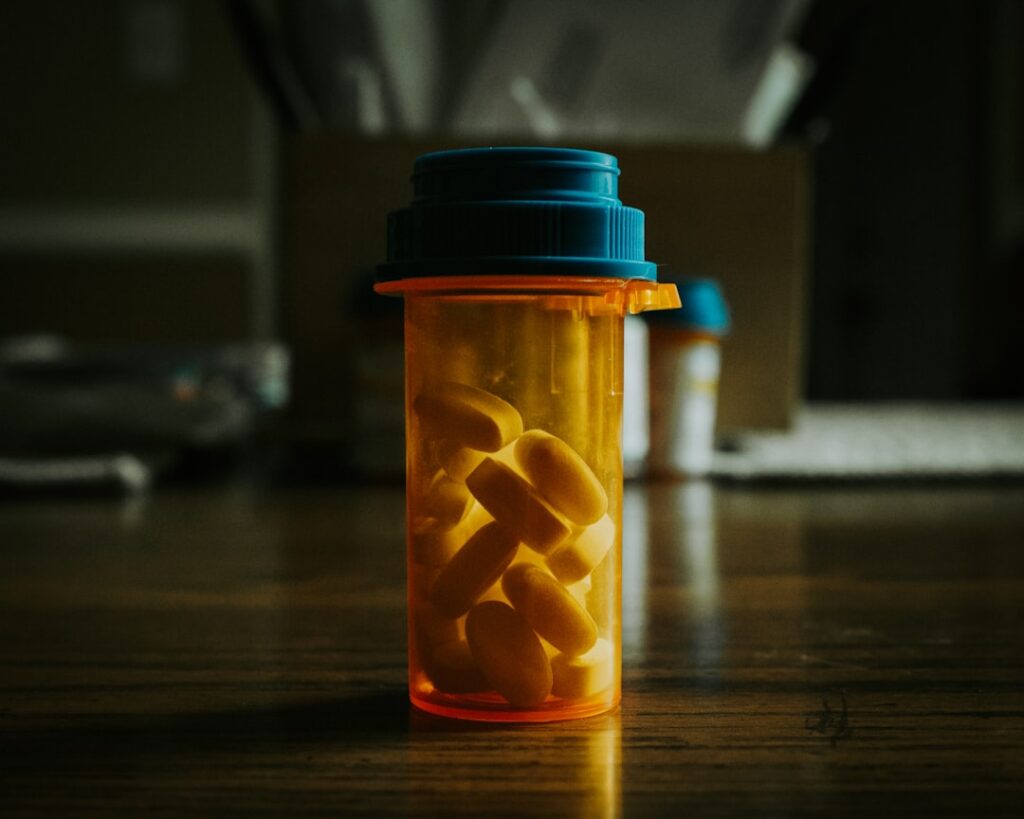 A close-up shot of a prescription pill bottle.